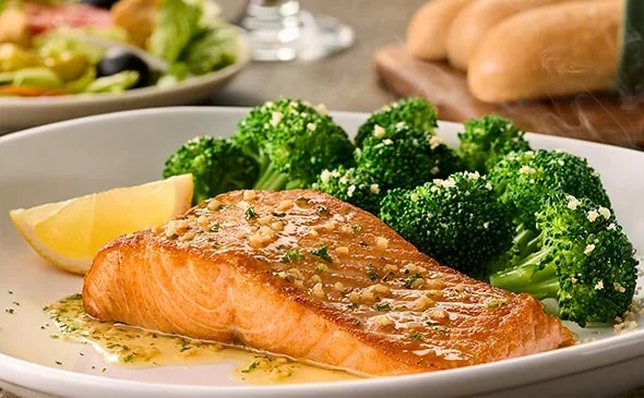 Order the Herb-Grilled Salmon with broccoli at Olive Garden. - Olive Garden Pasta Menu
