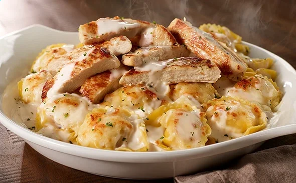 Get the Asiago Tortelloni Alfredo with Grilled Chicken - Olive Garden Pasta Menu