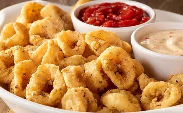 Start with the Calamari appetizer which comes with marinara sauce and creamy ranch. - Olive Garden Menu 2025