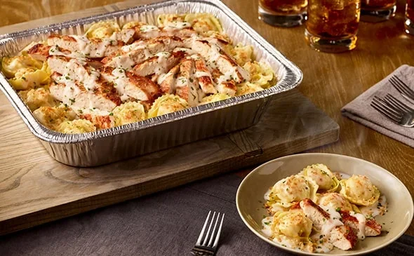 catering-asiago-tortelloni-alfredo-grilled-chicken - Olive Garden Catering Menu
